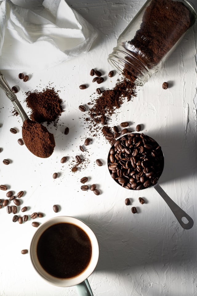 goldstruck coffee flat lay beans grounds cup